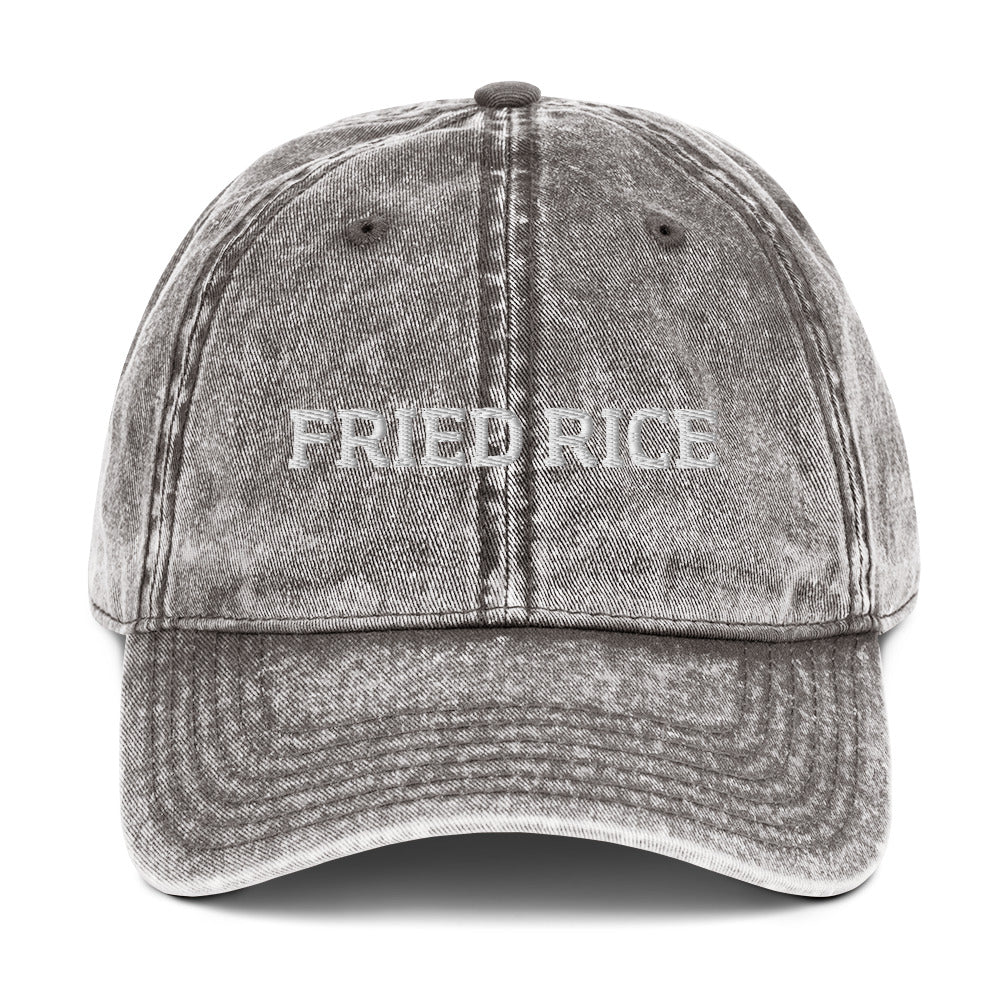Gray fried rice hat from Nina's Funky Shop by ninanush - Calling all fried rice enthusiasts! This funny fried rice dad hat is comfortable with a vintage-style washed out material and the words "Fried Rice", expertly embroidered on the front. Make a statement and share your foodie passions in this weird hat. The perfect dad hat for foodies or gift for fried rice lovers of all kinds.