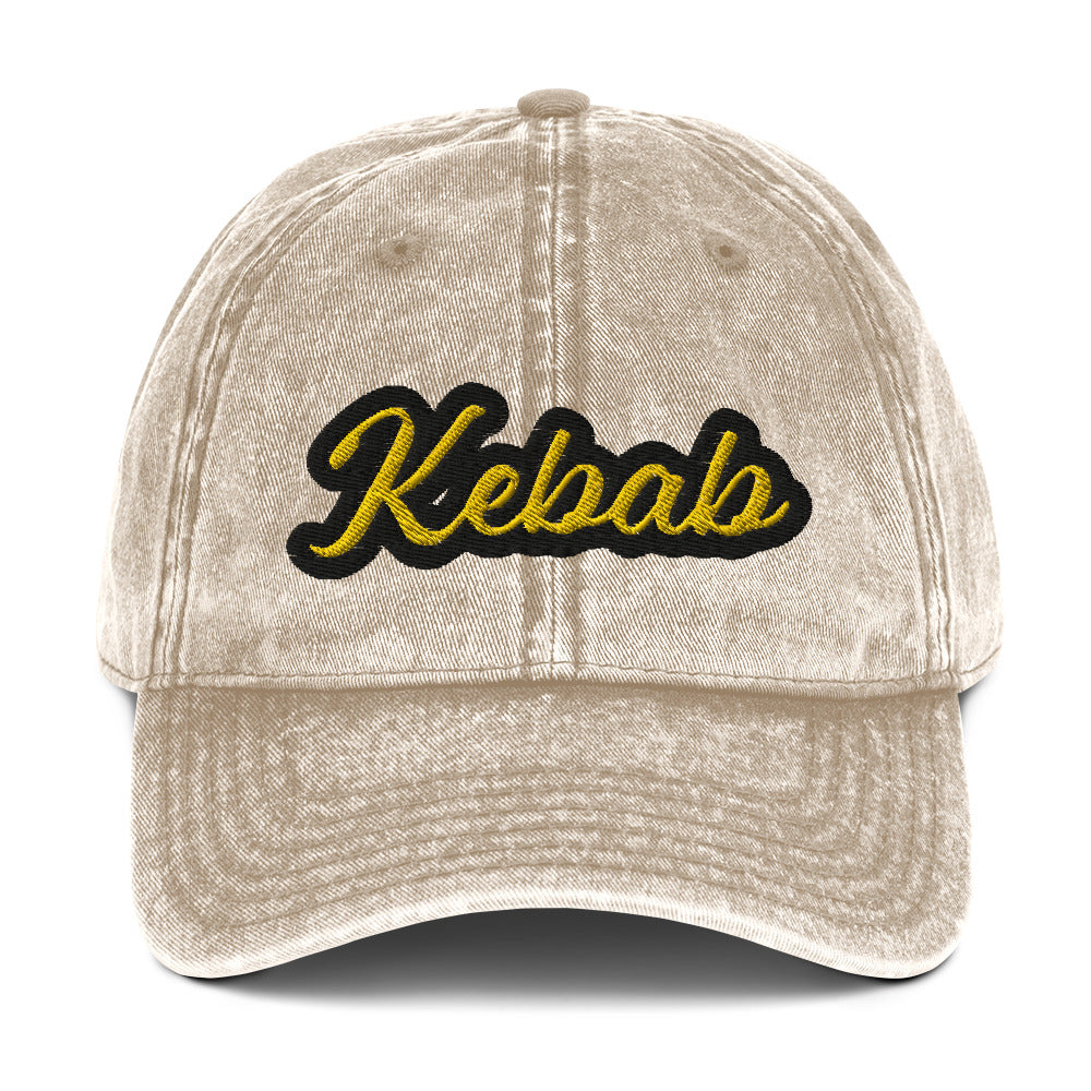 Khaki Kebab dad hat - This kebab dad hat, made of cotton, is designed for kebab enthusiasts. The hat showcases a washed-out cotton material with vintage-style embroidery. It's the ideal funny food hat for both kebab lovers and Middle Eastern foodies. This kebab hat is a unique, statement accessory for foodies or gift for kebab aficionados.