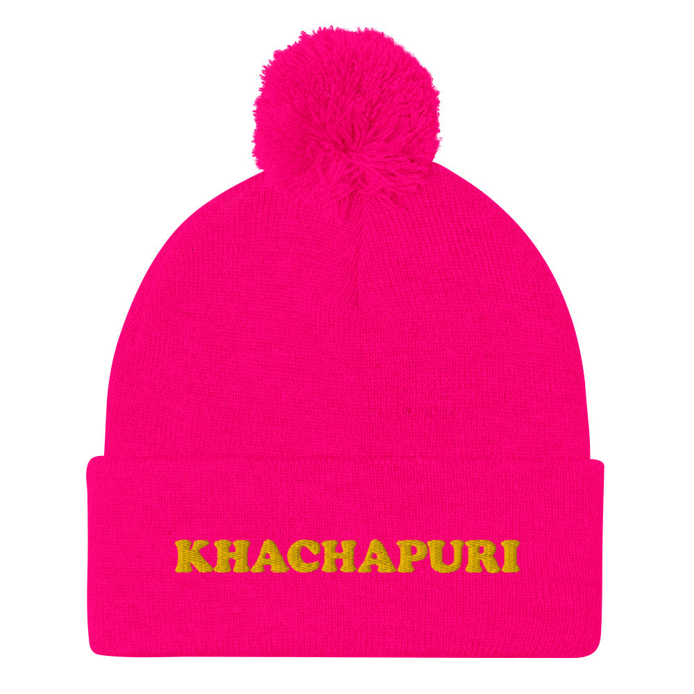 Hot pink beanie with yellow embroidery of khachapuri Georgian food - We love khachapuri! This khachapuri hat is a comfortable and unusual foodie beanie with a classic pom pom on top and a funky yellow embroidery. The beanie is cozy and just what every foodie and khachapuri lover needs. Celebrate your love for khachapuri and Georgean food in this this funky food beanie hat.
