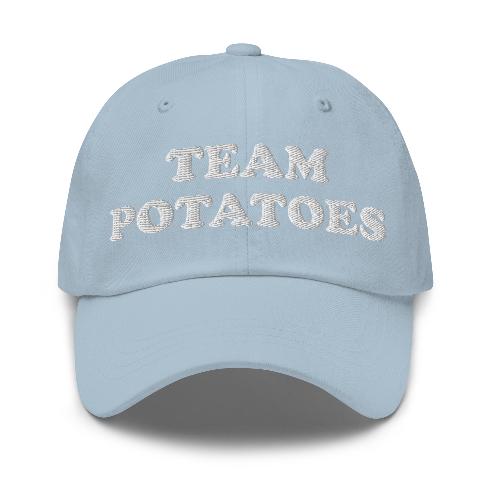 Light Blue Team Potatoes Hat - Big fan of mashed potatoes? Potato salad? Hash browns? Our Team Potatoes Hat is just what you need! It's a funny dad hat that's comfortable, adjustable and comes in a variety of colors with "Team Potatoes", expertly embroidered just for you.