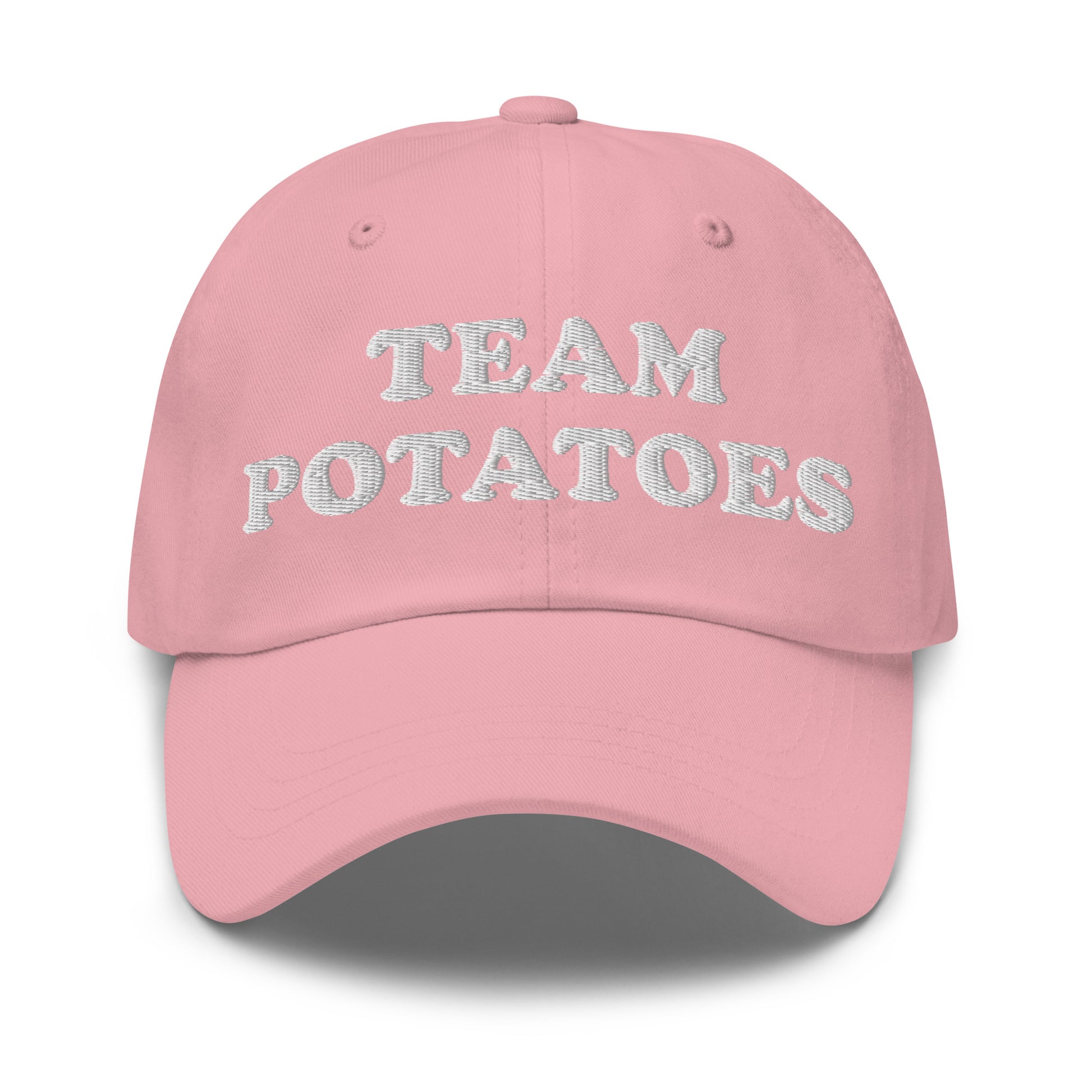 Pink Team Potatoes Hat - Big fan of mashed potatoes? Potato salad? Hash browns? Our Team Potatoes Hat is just what you need! It's a funny dad hat that's comfortable, adjustable and comes in a variety of colors with "Team Potatoes", expertly embroidered just for you.