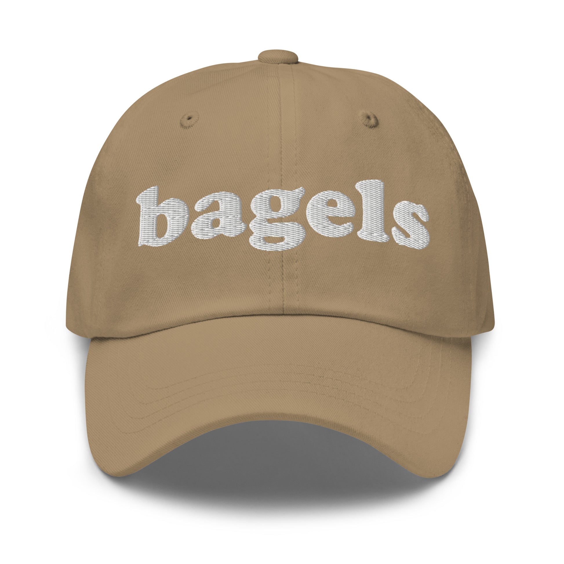 Khaki Bagels Hat - Our Bagels Hat is comfortable, adjustable and comes in a variety of colors, expertly embroidered just for you. It's a funny dad hat for bagels lovers and foodies alike. Perfect for everyday streetwear or a gift for a bagel enthusiast. 
