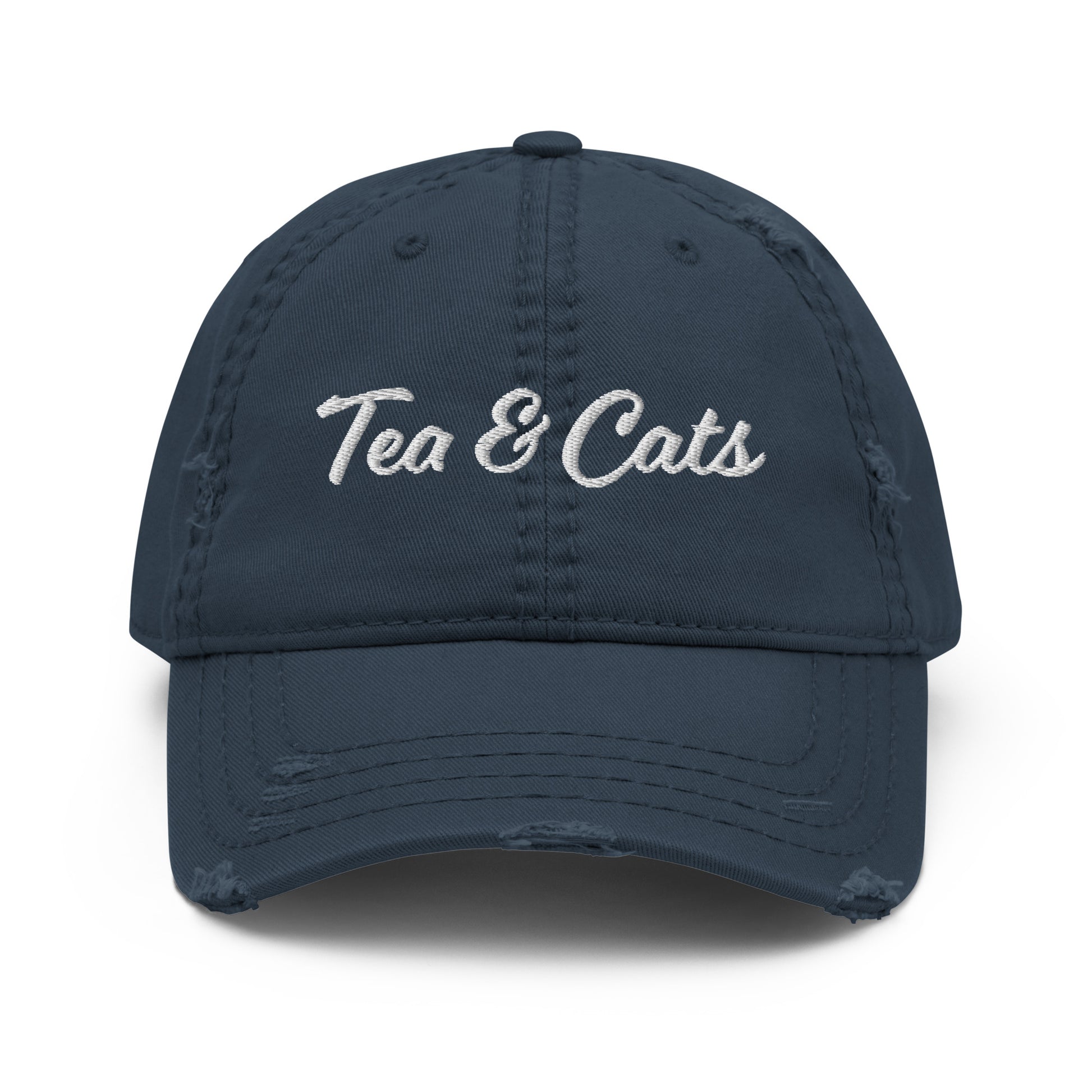Navy Tea and Cats Hat - Love cats? Tea drinker? This Tea & Cats Hat is just what you need. It's a comfortable cotton hat with an adjustable closure and "Tea & Cats", expertly embroidered on the front. Stand out in our funny apparel. It's unique, sarcastic, and perfect for everyday foodies. Designed by Nina and made just for you!