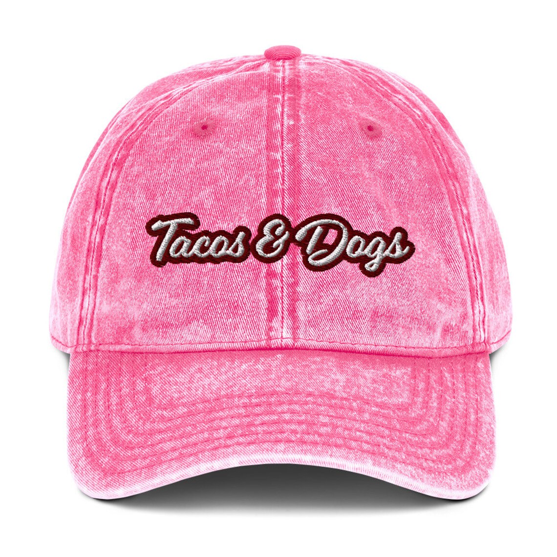 Pink dad hat for taco and dog lovers - The tacos and dogs dad hat is the perfect accessory for taco lovers and dog lovers and foodies of all kinds! It features a washed-out denim look, giving it a vintage feel. This funny food hat is the ultimate way to show off your love dogs and tacos, too. Wear it as a statement piece for everyday street wear or give it as a gift for foodies or your favorite dog parent - the ultimate dad hat for foodies, animal lovers and beyond.