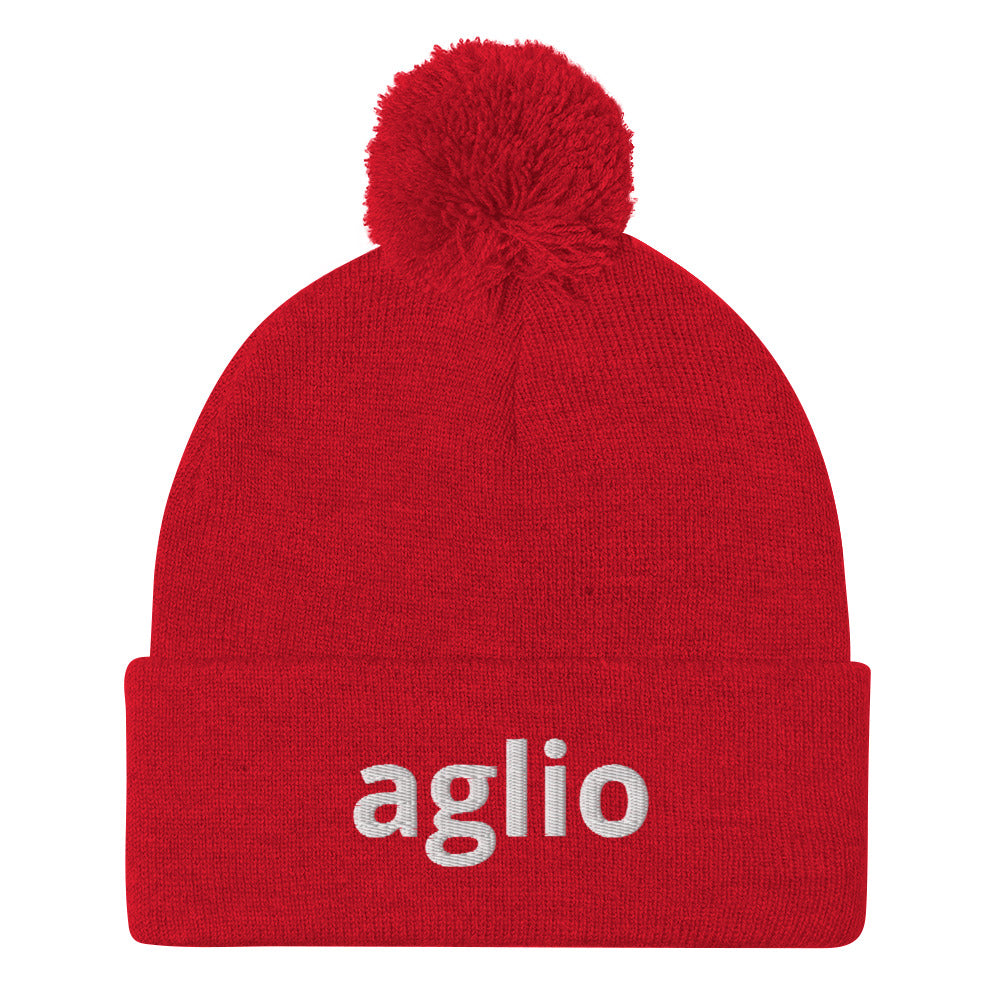 Red aglio beanie from Nina's Funky Shop by ninanush - An Italian garlic beanie for aglio lovers. This aglio hat is a classic pom pom beanie with a funny Italian word embroidery. The perfect cozy hat for Italians, garlic enthusiasts and foodies of all kinds. Stand out and share your love of garlic in this Italian garlic hat or give it as a cute gift for an Italian foodie.