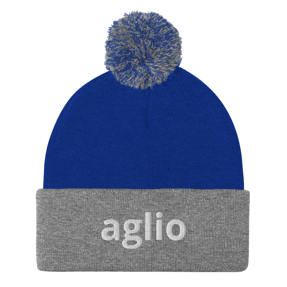 Heather gray and blue aglio beanie from Nina's Funky Shop by ninanush - An Italian garlic beanie for aglio lovers. This aglio hat is a classic pom pom beanie with a funny Italian word embroidery. The perfect cozy hat for Italians, garlic enthusiasts and foodies of all kinds. Stand out and share your love of garlic in this Italian garlic hat or give it as a cute gift for an Italian foodie.
