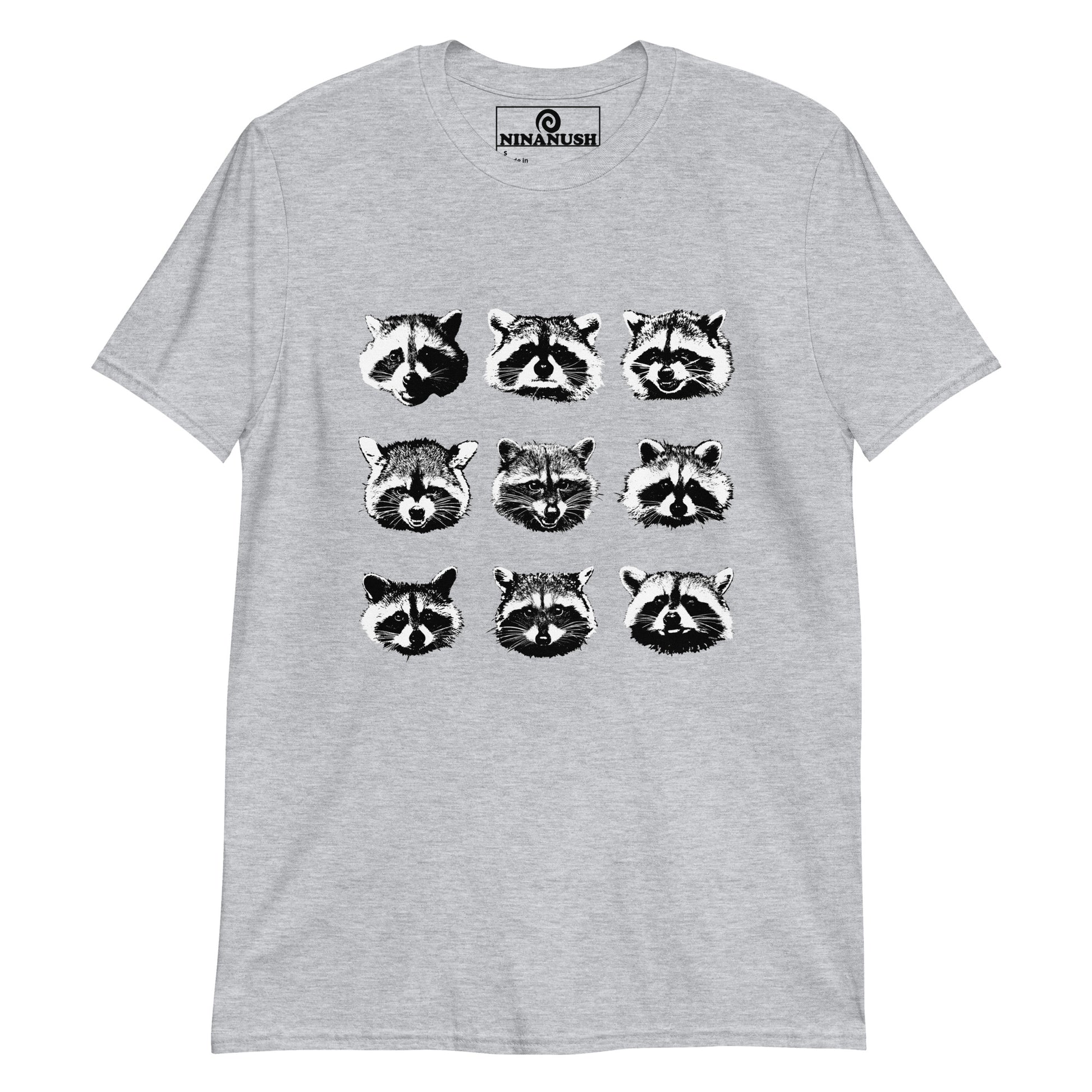 Light Gray Raccoon T-shirt from Nina's Funky Shop by ninanush - Do you love cute raccoons? Looking for a fun gift for raccoon lovers? This raccoon faces T-Shirt is just what you need. It's a soft and comfortable cotton shirt with nine unique and funny raccoon faces, expertly printed on the front. Stay weird in this funny raccoon t-shirt design. Perfect for raccoon enthusiasts of all kinds.