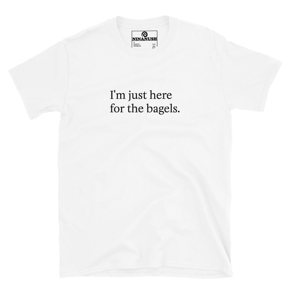 White funny bagel lover t-shirt - "I'm just here for the bagels." This bagel enthusiast t-shirt is a comfortable classic tee with a funny bagel quote on the front. Make a statement and eat bagels in this weird shirt for bagel lovers and foodies of all kinds. Great for everyday streetwear or a gift for your favorite bagel antisocial lover enthusiast. Celebrate your favorite foods in our funky foodie clothing and accessories. 