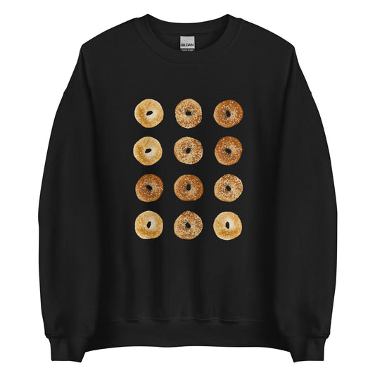 Black Bagels Crewneck Sweatshirt from Nina's Funky Shop by ninanush - Our Bagels Sweatshirt is soft, comfortable and a perfect foodie sweatshirt for bagel lovers. It's a unisex, classic crew neck sweatshirt that comes in a variety of colors with a dozen bagels, expertly printed on the front. Perfect for cozy nights in or stand out streetwear for foodies, this sweatshirt is hand drawn, designed by Nina and made just for you.