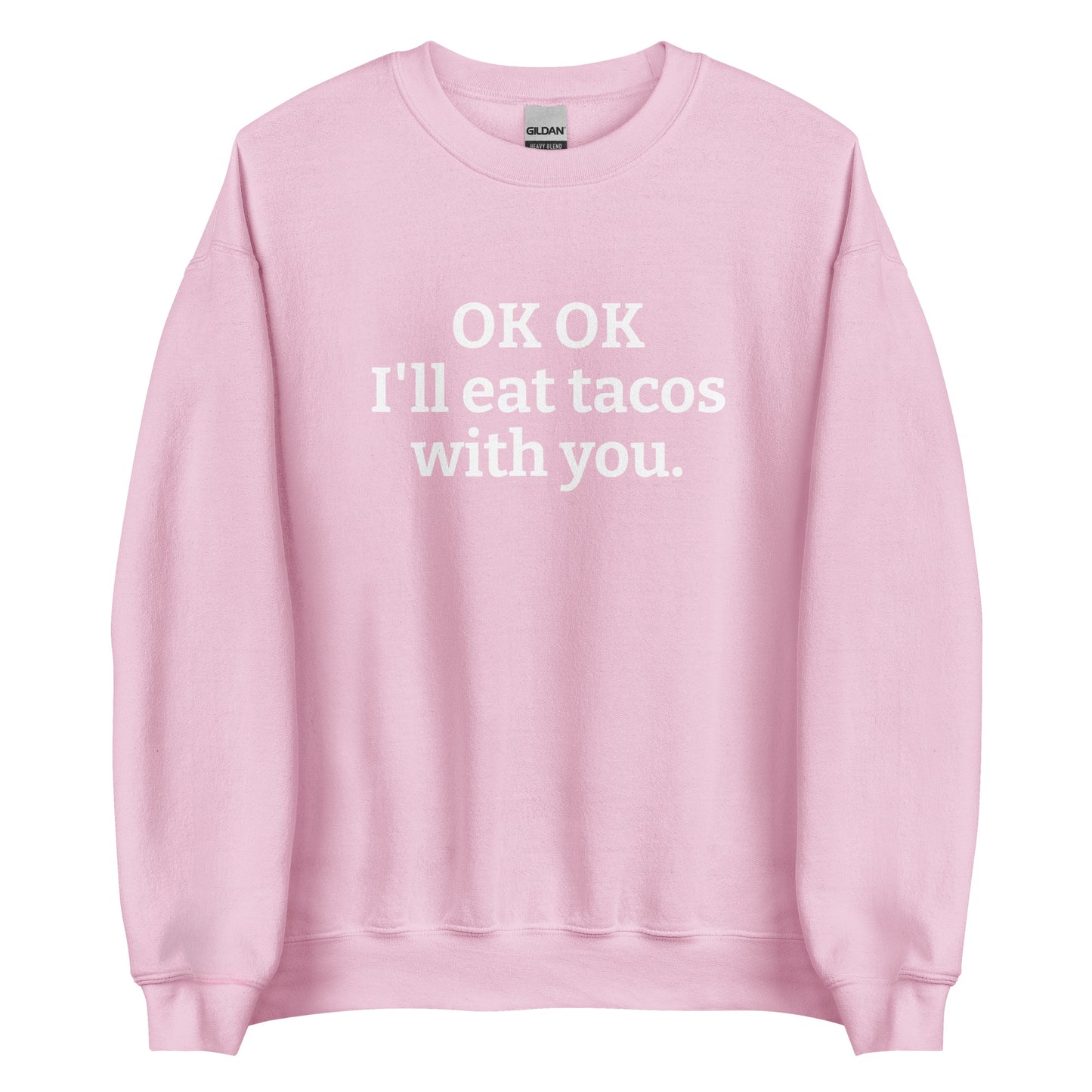 Light Pink OK OK I'll eat tacos with you Sweatshirt from Nina's Funky Shop by ninanush - Do you love tacos? Looking for a funny gift for a friend? Our taco lover crewneck sweatshirt is just what you need. It's a unisex taco sweatshirt with "OK OK I'll eat tacos with you." on the front. A funny taco sweatshirt for cozy nights in and quirky streetwear. This taco enthusiast sweatshirt is made just for you.