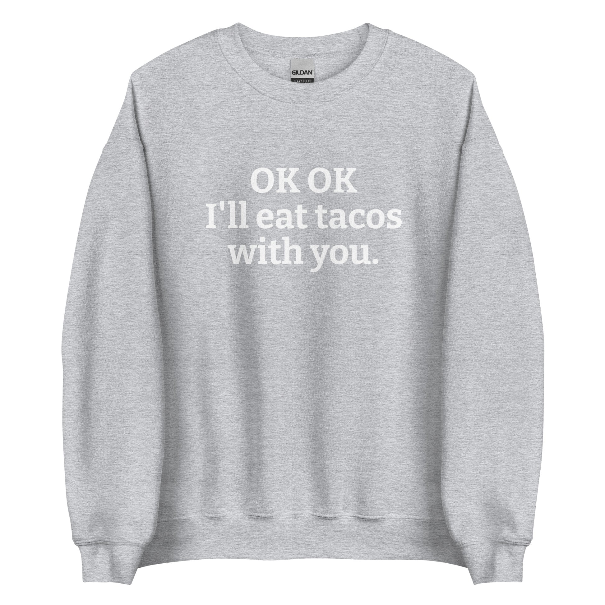 Light Gray OK OK I'll eat tacos with you Sweatshirt from Nina's Funky Shop by ninanush - Do you love tacos? Looking for a funny gift for a friend? Our taco lover crewneck sweatshirt is just what you need. It's a unisex taco sweatshirt with "OK OK I'll eat tacos with you." on the front. A funny taco sweatshirt for cozy nights in and quirky streetwear. This taco enthusiast sweatshirt is made just for you.