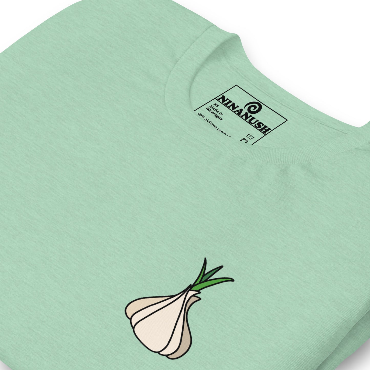 Green garlic t-shirt from Nina's Funky Shop by ninanush - Calling all garlic lovers! This classic cotton tee comes in a variety of colors with a head of garlic expertly printed on the front. It's a unique garlic lover graphic tee that stands out and makes the perfect funky shirt for garlic enthusiasts. Eat garlic in style and make a statement in our funny foodie clothing and accessories.