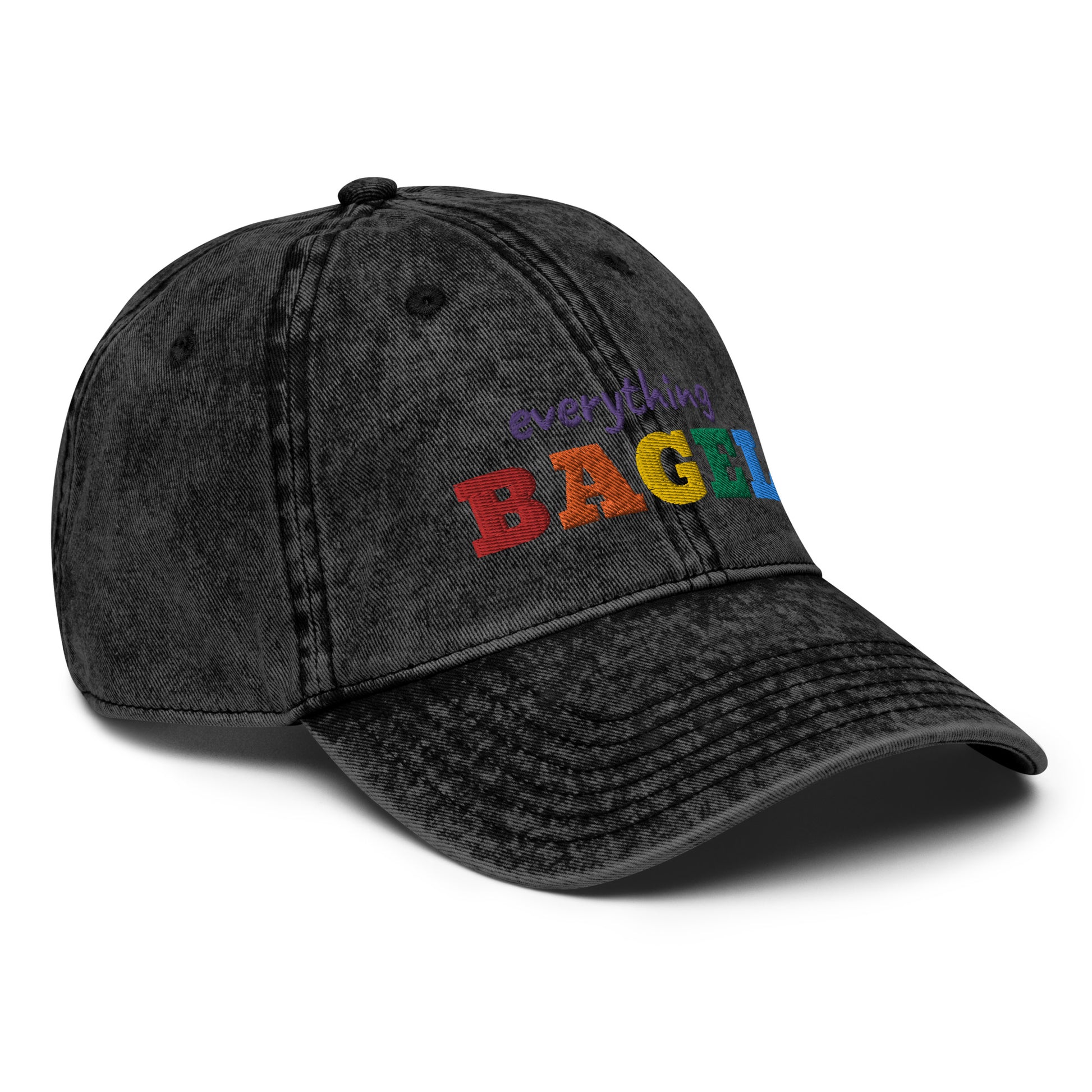 Black Everything Bagel Hat for Pride -Our Everything Bagel Pride Hat is comfortable, has an adjustable closure, and comes in a variety of colors with a funny rainbow design for pride, expertly embroidered on the front. The perfect hat for pride month and for bagel lovers or all kinds. Celebrate your favorite foods in our funky foodie clothing and accessories. Designed by Nina and made just for you!