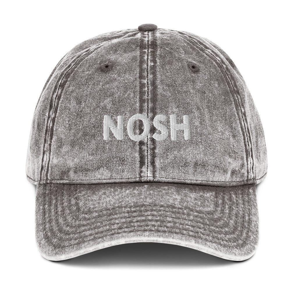 Gray nosh hat - A nosh hat with a simple text embroidery, vintage-style faded material and it comes in a variety of colors. It's a funny dad hat for foodies or a gift for noshers and food enthusiasts. Nosh on your favorite foods in this yiddish word hat. It's a perfect hat for everyday wear and a unique dad hat for snack lovers.