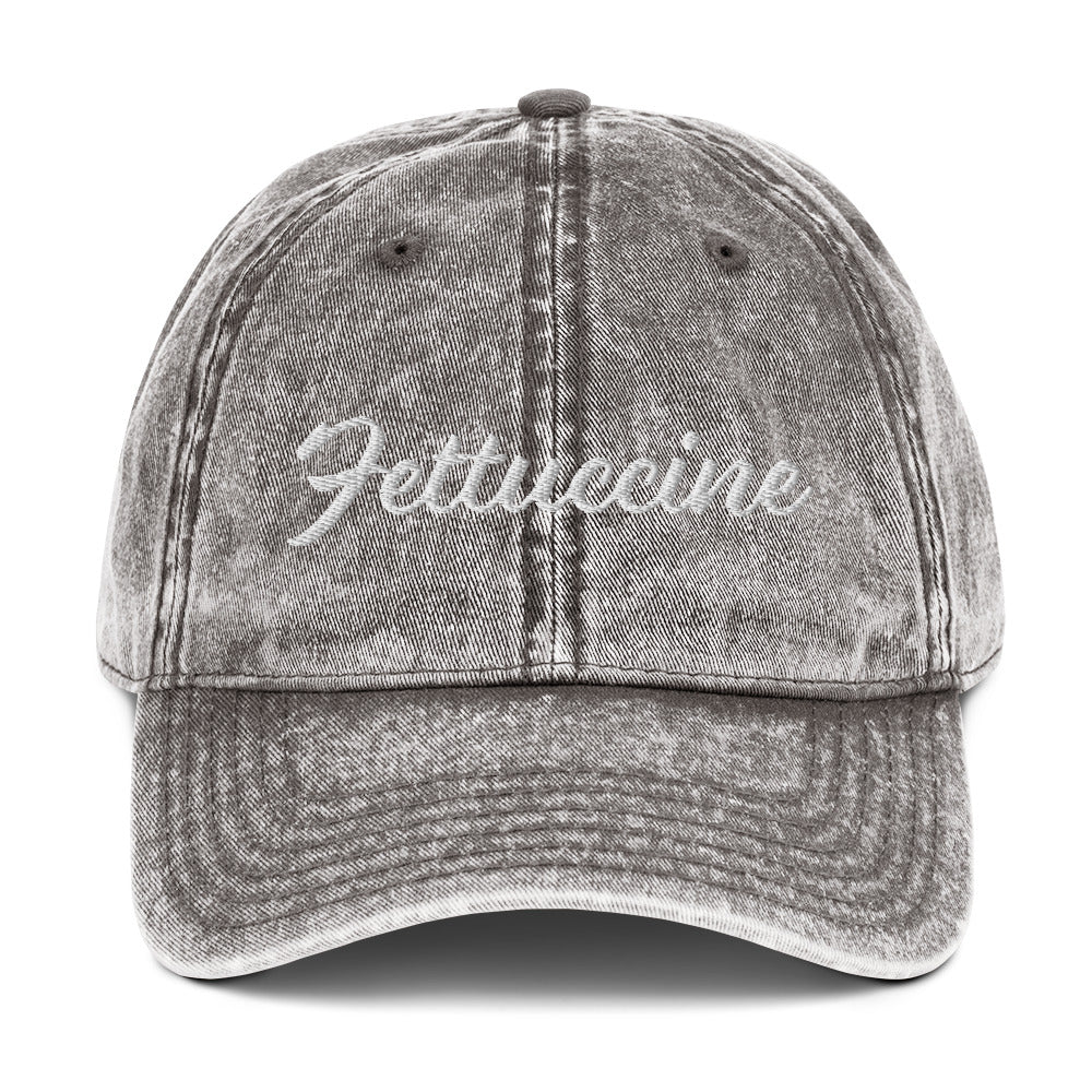Gray Fettuccine Hat - Love fettuccine? Looking for a funny gift for a pasta enthusiast? This Unique Fettuccine Hat is just what you need. It's comfortable, and comes in a variety of colors with "Fettuccine", expertly embroidered on the front. Eat your favorite pasta in this funny foodie dad hat. Perfect for fettuccine lovers and beyond.
