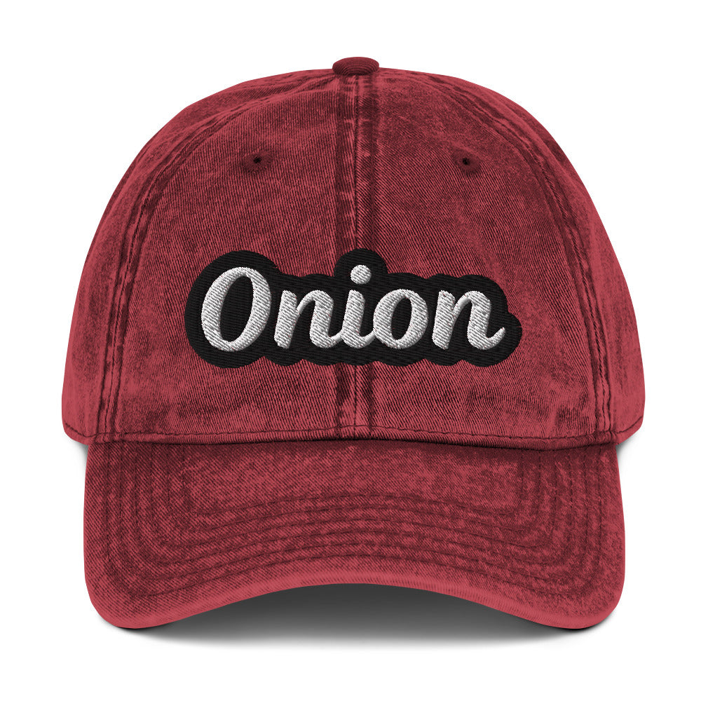 Maroon onion hat from Nina's Funky Shop by ninanush - This onion dad hat is comfortable, adjustable and the perfect weird hat for everyday fashion. It has a faded vintage-style material, expertly embroidered with the word "onion". Wear this onion hat and make a statement or give it as a gift to an onion enthusiast. Celebrate your favorite foods in our funny food hats, tees and accessories.