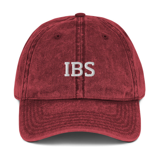 Maroon IBS dad hat from Nina's Funky Shop by ninanush - Share your gastrointestinal condition with the world in our IBS hat. Its a funny hat that has a stylish washed out material and "IBS" on the front. It's the perfect dad hat for foodies with IBS or a funny gift for a friend with IBS. Celebrate your favorite food and drinks in our funky foodie apparel, designed by Nina.