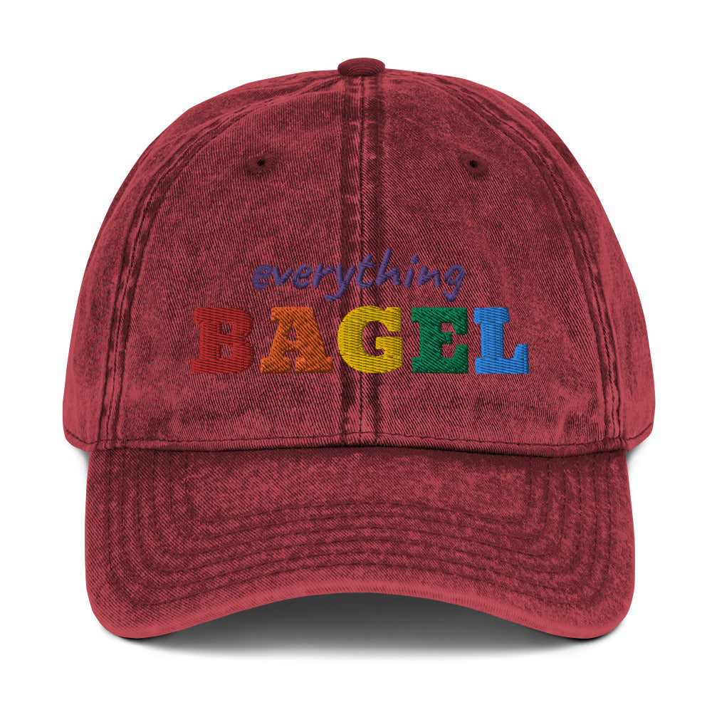 Maroon Everything Bagel Hat for Pride -Our Everything Bagel Pride Hat is comfortable, has an adjustable closure, and comes in a variety of colors with a funny rainbow design for pride, expertly embroidered on the front. The perfect hat for pride month and for bagel lovers or all kinds. Celebrate your favorite foods in our funky foodie clothing and accessories. Designed by Nina and made just for you!
