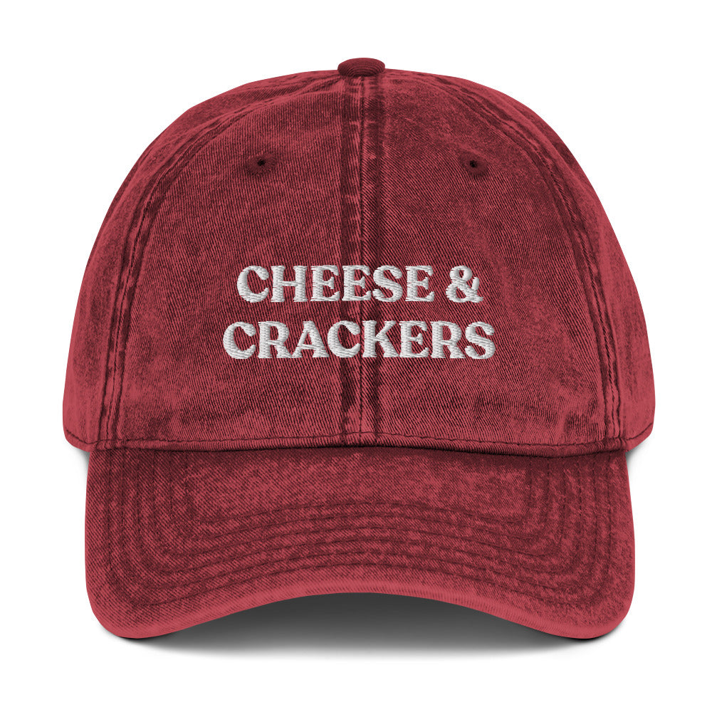 Maroon cheese and crackers hat - Our Cheese & Crackers Hat is made of comfortable cotton and expertly embroidered just for you. It's a classic dad hat that's perfect for everyday streetwear that will have people asking "Where'd you get that hat?" Make a statement in this funny foodie dad hat.