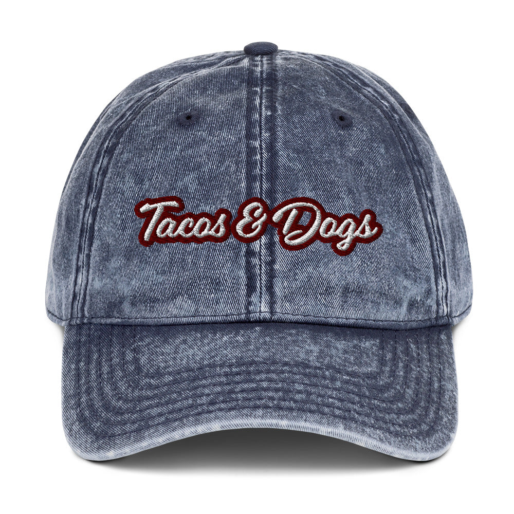 Unique blue embroidered dad hat for foodies and dog lovers - The tacos and dogs dad hat is the perfect accessory for taco lovers and dog lovers and foodies of all kinds! It features a washed-out denim look, giving it a vintage feel. This funny food hat is the ultimate way to show off your love dogs and tacos, too. Wear it as a statement piece for everyday street wear or give it as a gift for foodies or your favorite dog parent - the ultimate dad hat for foodies, animal lovers and beyond.