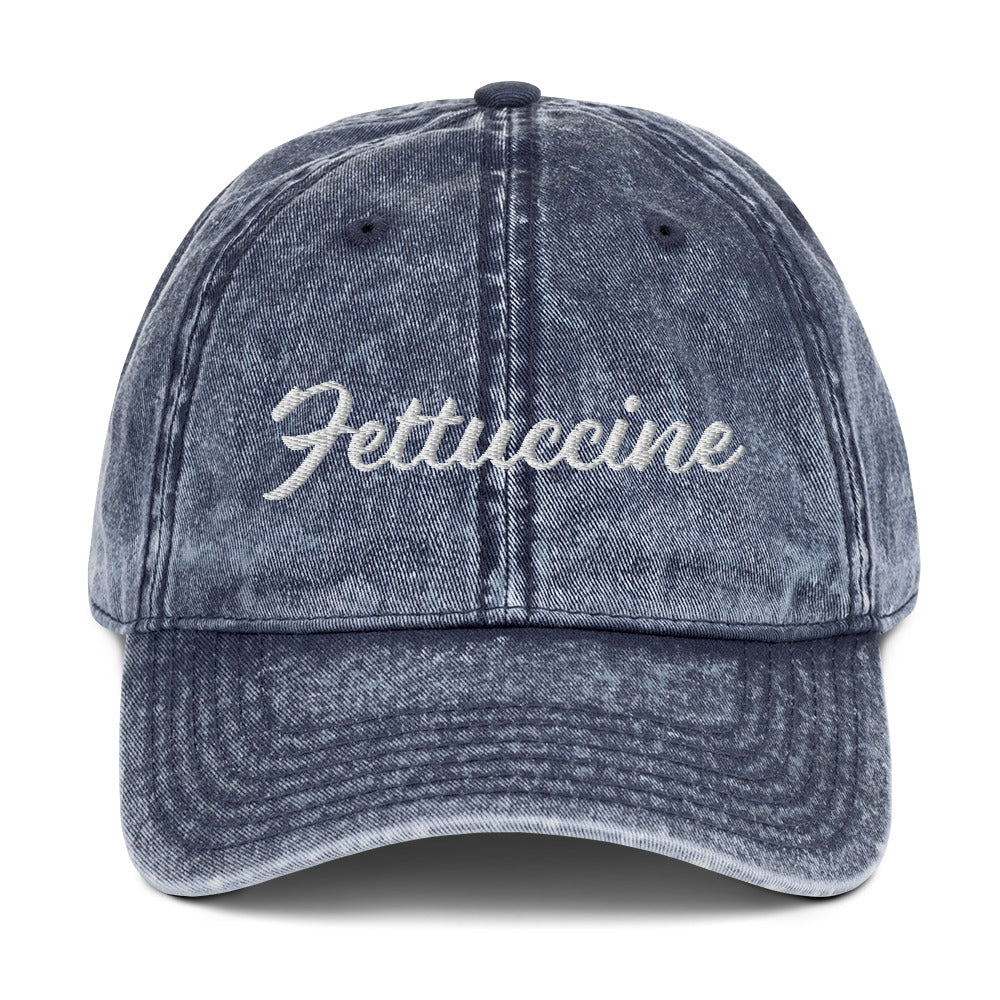 Blue Fettuccine Hat - Love fettuccine? Looking for a funny gift for a pasta enthusiast? This Unique Fettuccine Hat is just what you need. It's comfortable, and comes in a variety of colors with "Fettuccine", expertly embroidered on the front. Eat your favorite pasta in this funny foodie dad hat. Perfect for fettuccine lovers and beyond.