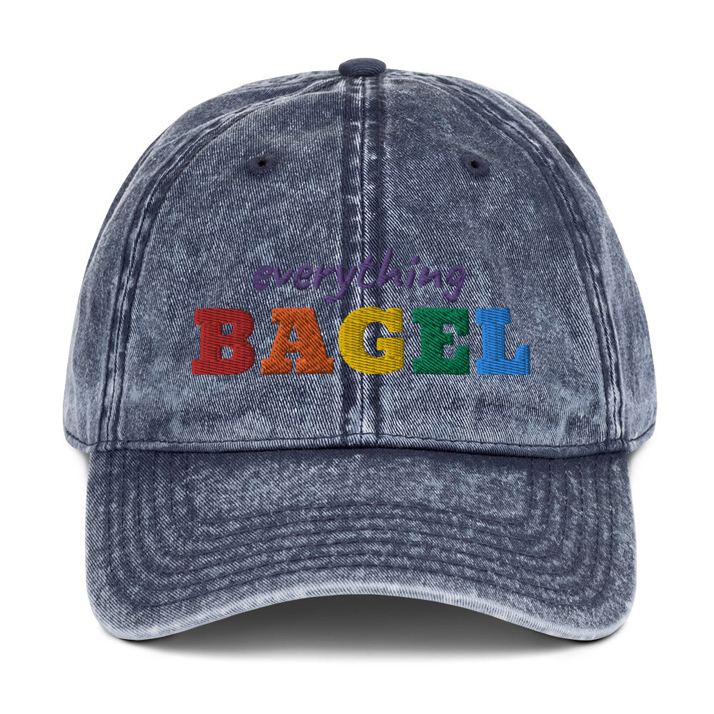 Blue Everything Bagel Hat for Pride -Our Everything Bagel Pride Hat is comfortable, has an adjustable closure, and comes in a variety of colors with a funny rainbow design for pride, expertly embroidered on the front. The perfect hat for pride month and for bagel lovers or all kinds. Celebrate your favorite foods in our funky foodie clothing and accessories. Designed by Nina and made just for you!