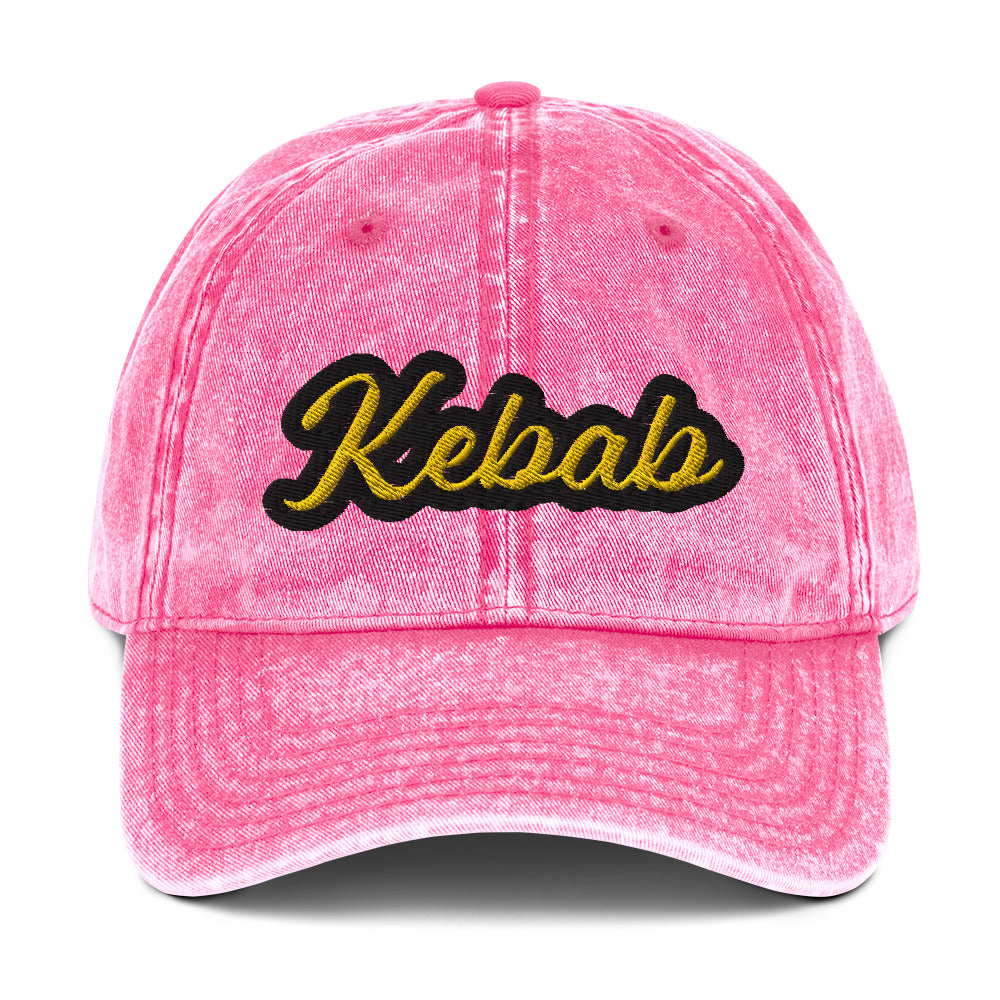 Pink kebab dad hat - This kebab dad hat, made of cotton, is designed for kebab enthusiasts. The hat showcases a washed-out cotton material with vintage-style embroidery. It's the ideal funny food hat for both kebab lovers and Middle Eastern foodies. This kebab hat is a unique, statement accessory for foodies or gift for kebab aficionados. 