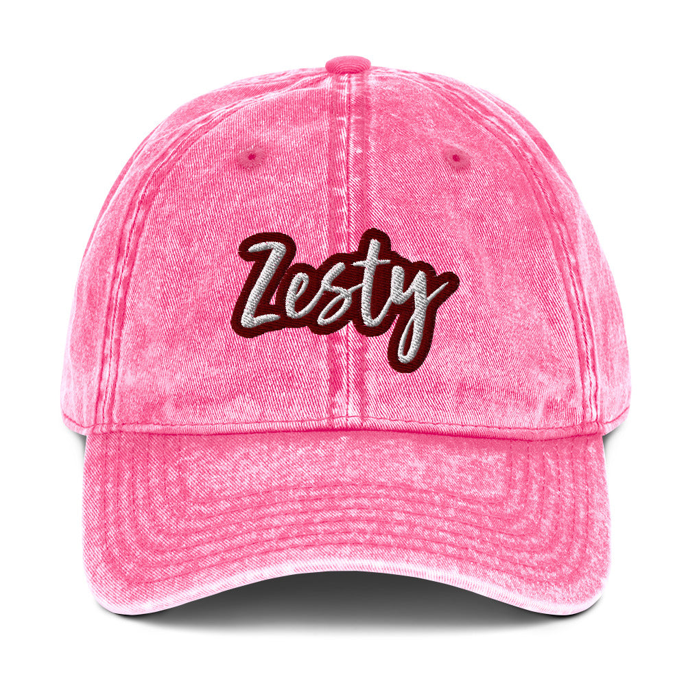Pink zesty hat - The Zesty Dad Hat, a perfect accessory to add a touch of personality to your outfit. With a vintage-style faded look, a red and white unique embroidery, and an adjustable strap, this quirky dad hat was made just for you. Wear this colorful dad hat as everyday wear or give this hat as a funny gift to a zesty friend.