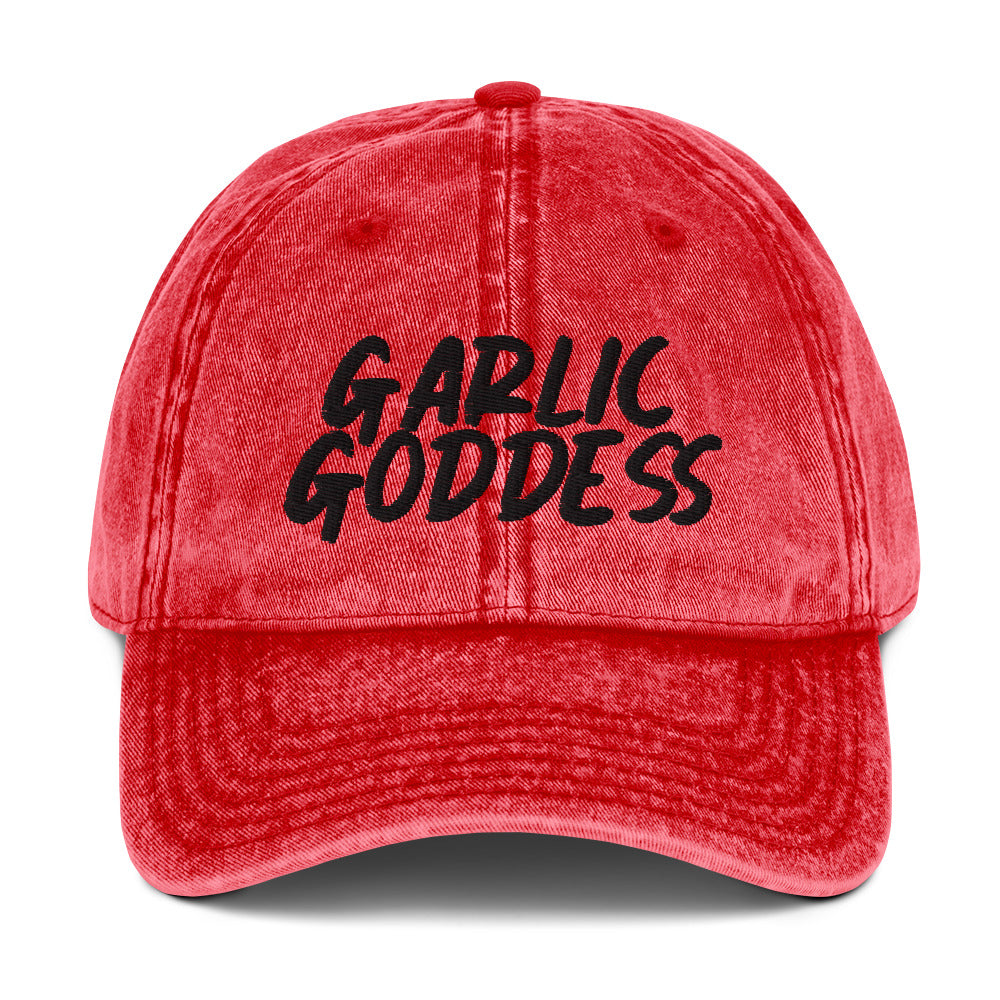 Red garlic goddess dad hat from Nina's Funky Shop by ninanush - This unique garlic dad hat comes in a variety of colors with Garlic Goddess on the front. Our Garlic Goddess hat was designed by Nina especially for garlic enthusiasts and foodies of all kinds. Stay funky and eat garlic in this embroidered vintage style dad hat or give it as a unique gift for a garlic lover.