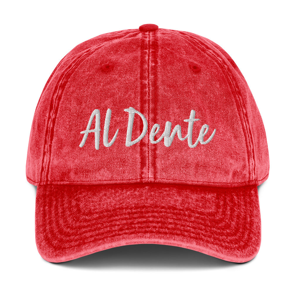 Red Al Dente Hat - This Al Dente Hat is perfect for pasta lovers and foodies of all kinds. It's comfortable, has an adjustable closure, and comes in a variety of colors with "Al Dente", expertly embroidered on the front. Celebrate your favorite foods in our funky foodie clothing and accessories. Designed by Nina and made just for you!