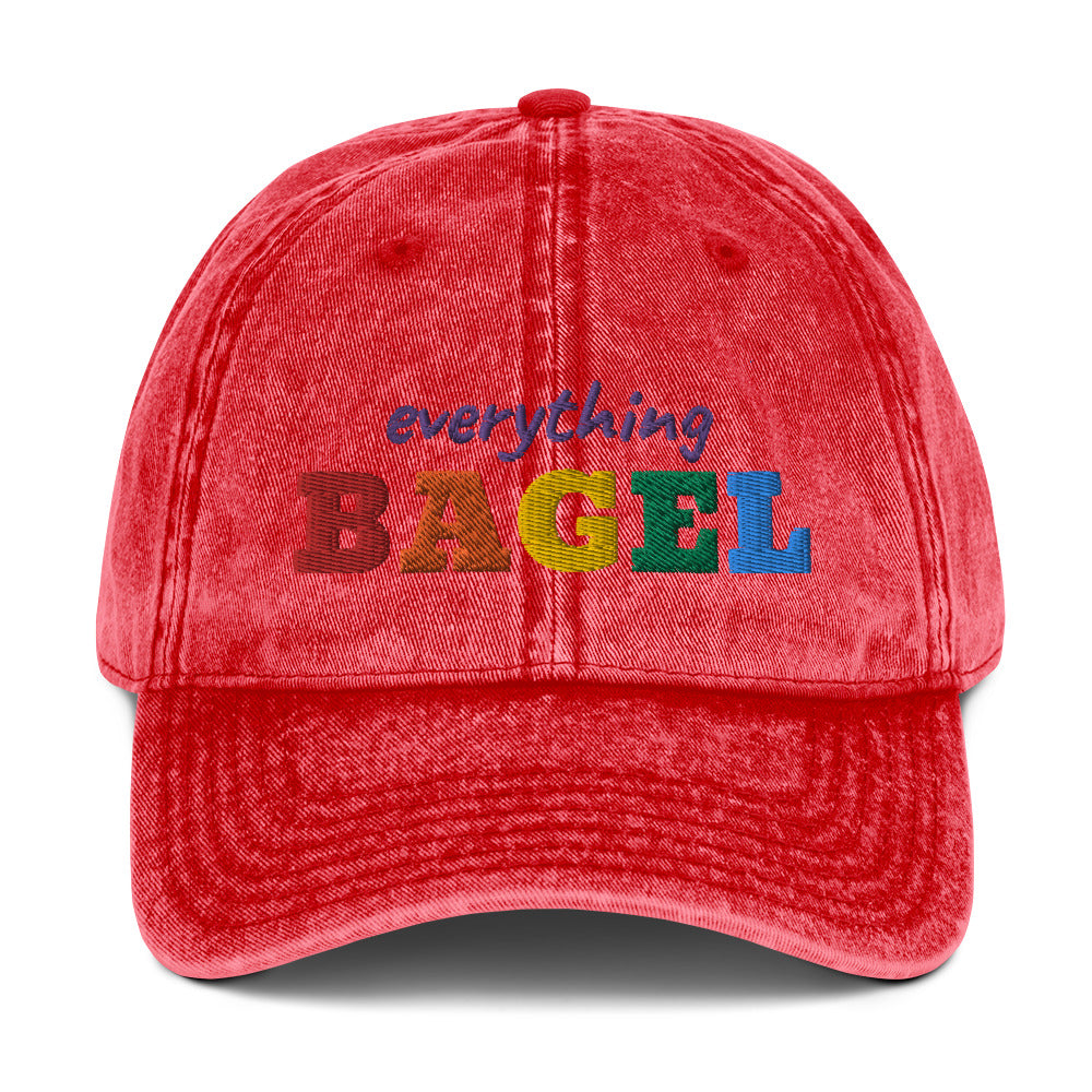 Red Pride Hat for Bagel Lovers - Our Everything Bagel Pride Hat is comfortable, has an adjustable closure, and comes in a variety of colors with a funny rainbow design for pride, expertly embroidered on the front. The perfect hat for pride month and for bagel lovers or all kinds. Celebrate your favorite foods in our funky foodie clothing and accessories. Designed by Nina and made just for you!