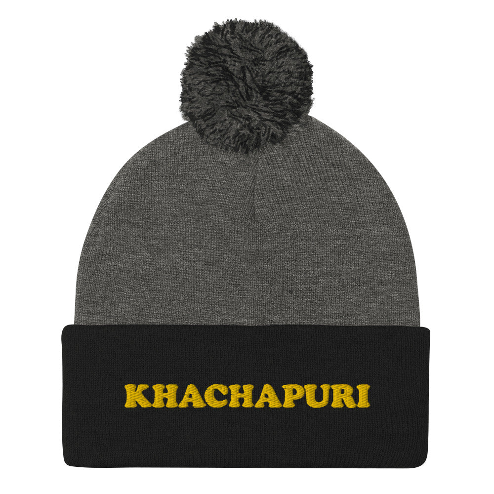 Gray and black beanie with Georgian food embroidery - We love khachapuri! This khachapuri hat is a comfortable and unusual foodie beanie with a classic pom pom on top and a funky yellow embroidery. The beanie is cozy and just what every foodie and khachapuri lover needs. Celebrate your love for khachapuri and Georgean food in this this funky food beanie hat. 