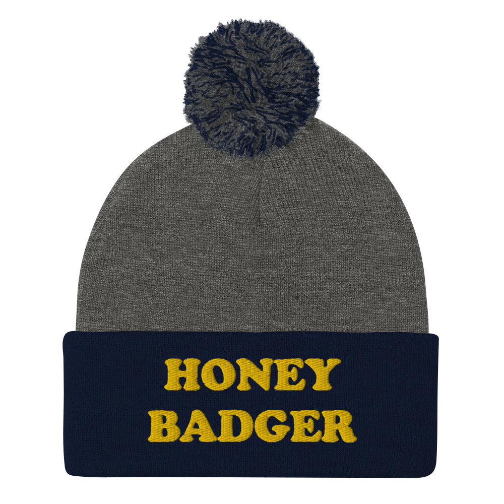 Gray and Navy - What's your spirit animal? This honey badger beanie is a perfect warm and cozy hat for cold weather. The funny animal beanie has a honey badger embroidery that's a perfect unique gift for honey badger & animal lovers. Shop funny spirit animal beanies, foodie clothing, vegan graphic t-shirts, garlic hats and more. 