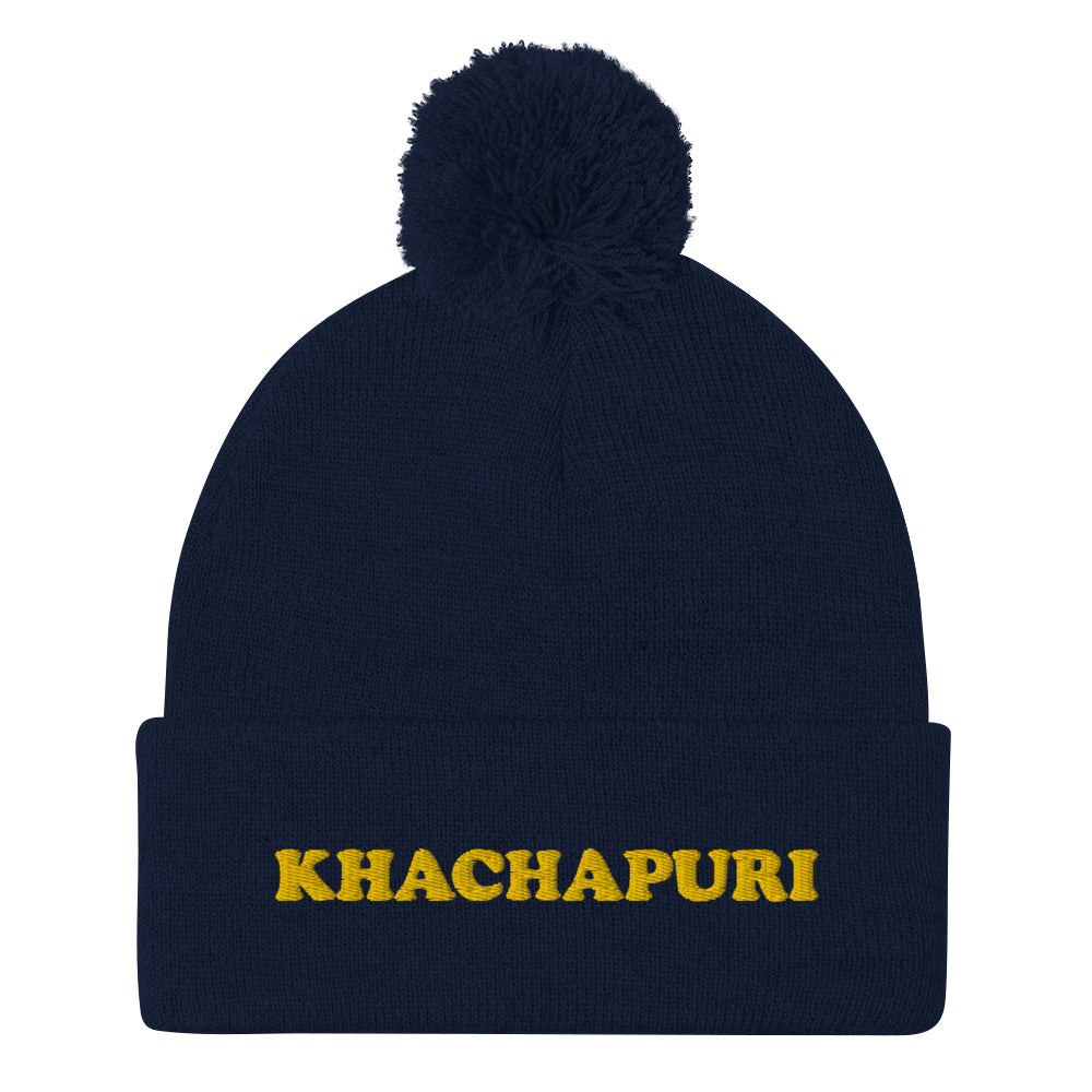 Navy blue beanie with khachapuri embroidery - We love khachapuri! This khachapuri hat is a comfortable and unusual foodie beanie with a classic pom pom on top and a funky yellow embroidery. The beanie is cozy and just what every foodie and khachapuri lover needs. Celebrate your love for khachapuri and Georgean food in this this funky food beanie hat. 