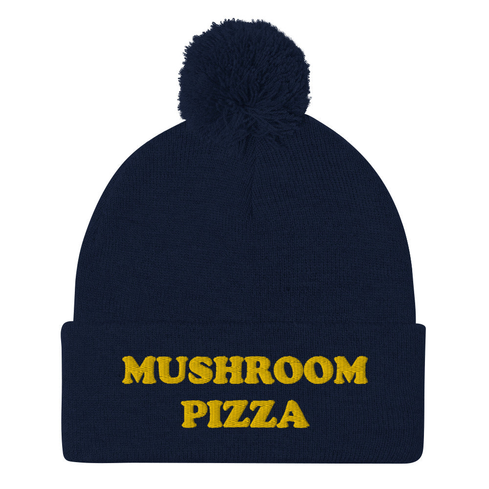 Navy blue mushroom pizza beanie with pompom - What do you put on your pizza? This mushroom pizza beanie is a perfect warm & cozy hat for cold weather. It's a classic beanie with a pom pom on top and a unique foodie embroidery. The mushroom pizza hat is a weird gift for foodies and a funny food hat for mushroom pizza lovers. Stay funky and show your love for pizza.